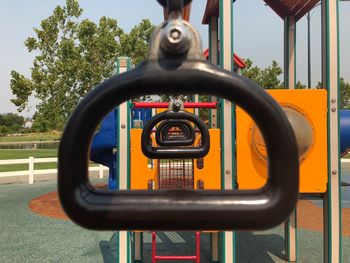 Close-up of machine part in playground