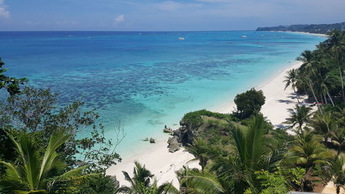 Scenic view of blue sea on sunny day