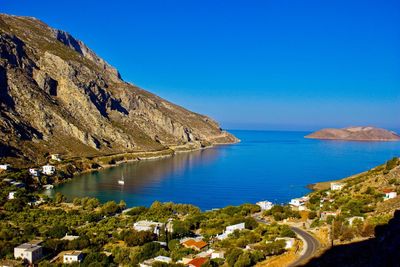 Scenic view of sea against clear blue sky