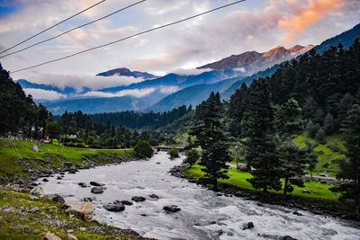 Scenic view of mountains against sky during winter