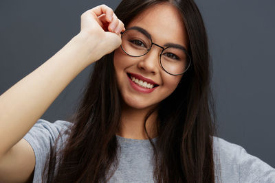 Happy girl wearing eyeglasses