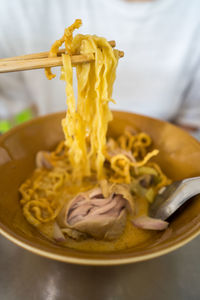 Spicy northern thai chicken noodle curry soup.