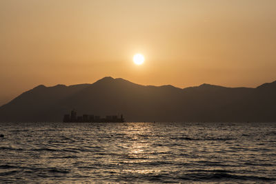 Scenic view of sea against sky during sunset