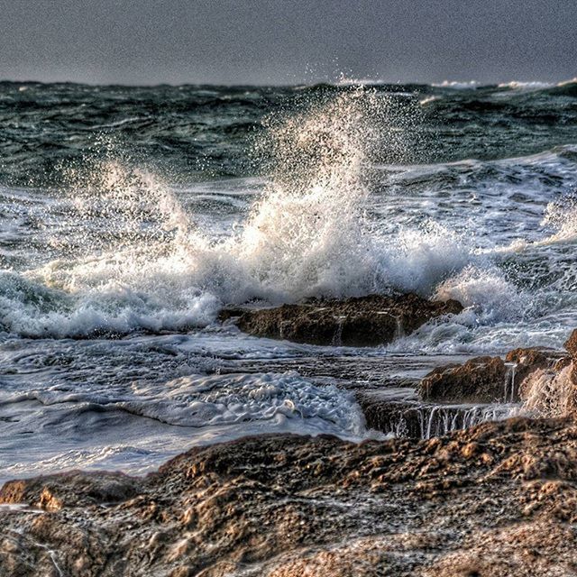 sea, water, wave, surf, horizon over water, motion, beauty in nature, scenics, splashing, beach, shore, nature, rock - object, power in nature, tranquil scene, tranquility, idyllic, seascape, tide, sky