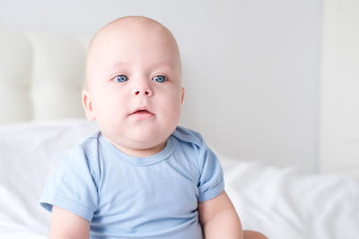 Close-up of cute baby boy at home