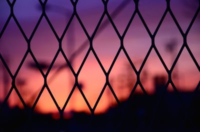 Full frame shot of fence during sunset