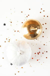 High angle view of berries on white table