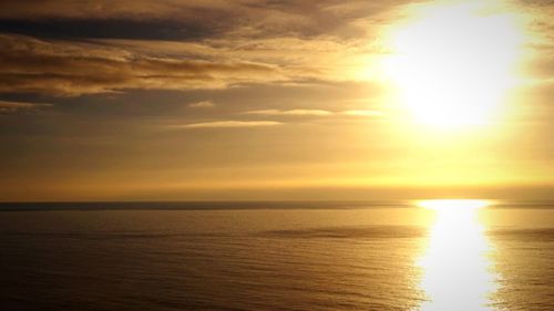 Scenic view of sea at sunset