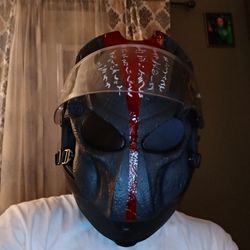 Close-up portrait of man wearing mask