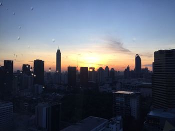 View of buildings against sky during sunset