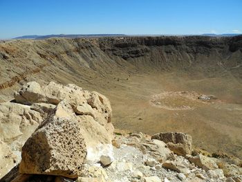 Scenic view of rock formation against clear sky