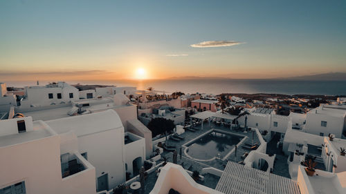 High angle view of townscape against sky during sunset