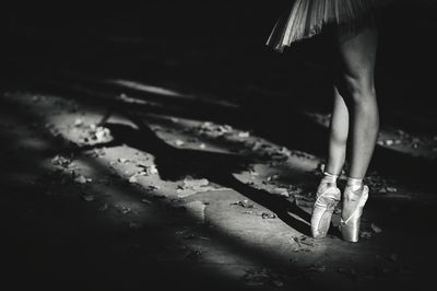 Low section of woman standing on floor