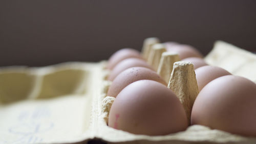 Close-up of eggs in carton