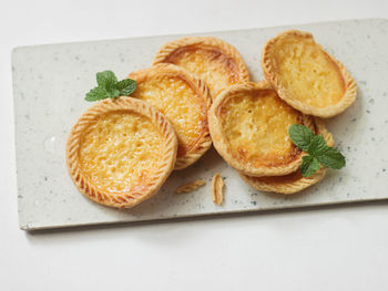 Cake of pie. custard tarts or pie susu on marble board 