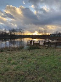 Scenic view of lake against sky during sunset