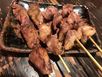 Close-up of meat on barbecue grill