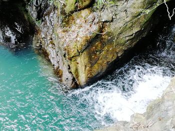 High angle view of rock formation in sea