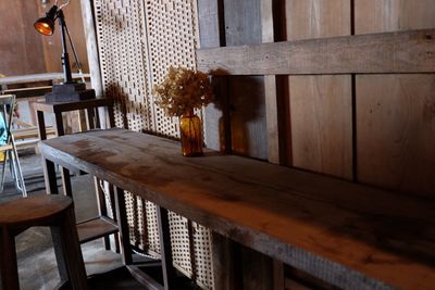 Wooden chairs and table in restaurant