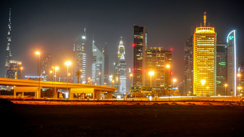 Illuminated city at night