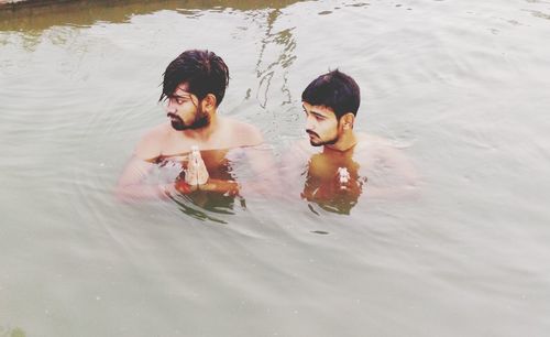 High angle view of men in water