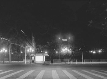 Illuminated street lights at night