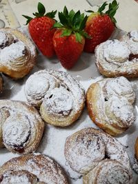 High angle view of strawberries on table