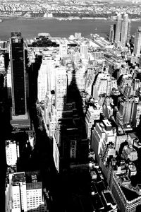 Aerial view of cityscape against sky