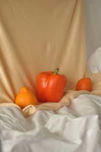 Close-up of orange pepper bell and citrus