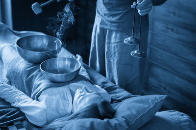 Midsection of man preparing food