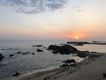 Scenic view of sea against sky during sunset