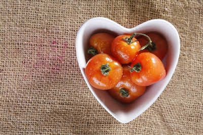 High angle view of tomatoes in bowl on table