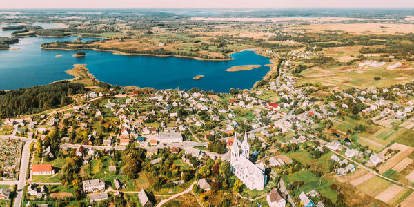 High angle view of townscape by sea