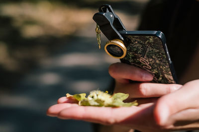 Close-up of person holding food