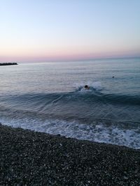 Scenic view of sea against clear sky