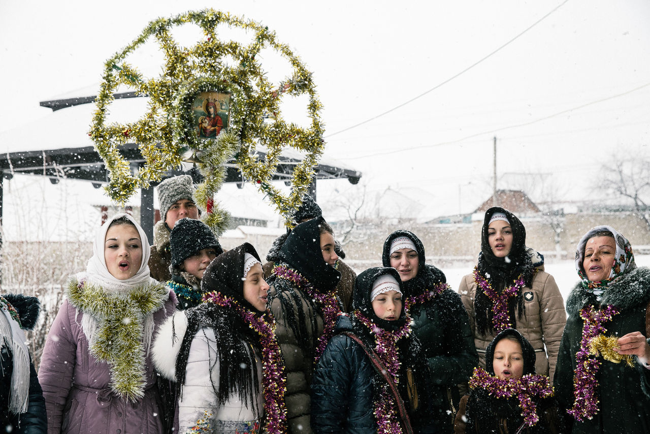 real people, celebration, group of people, winter, young adult, women, clothing, warm clothing, event, people, cold temperature, emotion, happiness, nature, young women, snow, lifestyles, decoration