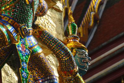 Low angle view of buddha statue