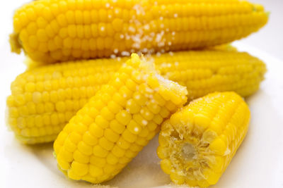 High angle view of yellow eggs on table