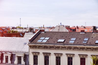 View of residential buildings against sky