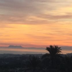 Scenic view of dramatic sky at sunset