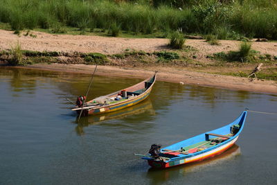 High angle view of boat moored in river