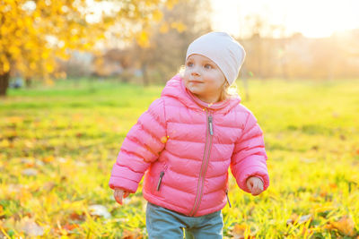 Girl standing on field