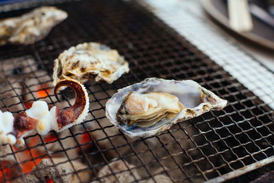 Close-up of seafood on barbecue grill