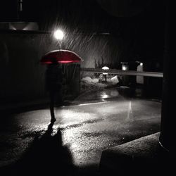 Blurred motion of woman at night