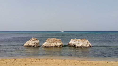 Scenic view of sea against clear sky