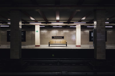 Empty bench at berlin nordbahnhof station platform