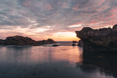 Scenic view of sea against sky during sunset