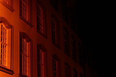 Low angle view of illuminated building at night