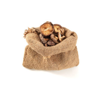 High angle view of bread against white background