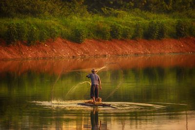 Man working in lake